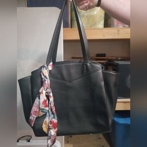 Black Michael Kors tote with floral handkerchief.